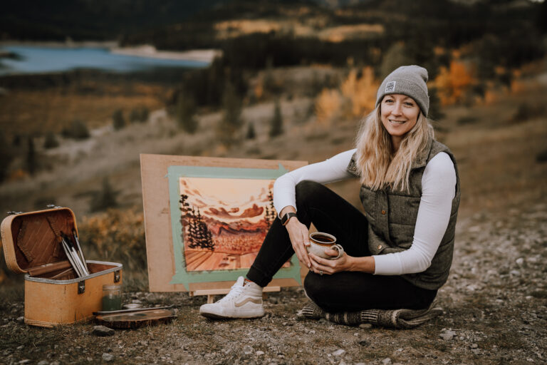 Stephanie Fowler portrait with art supplies in the autumn